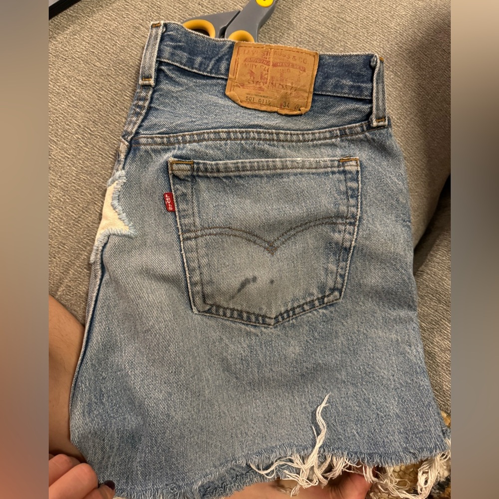 Vintage button fly Levi cutoffs with star patch
